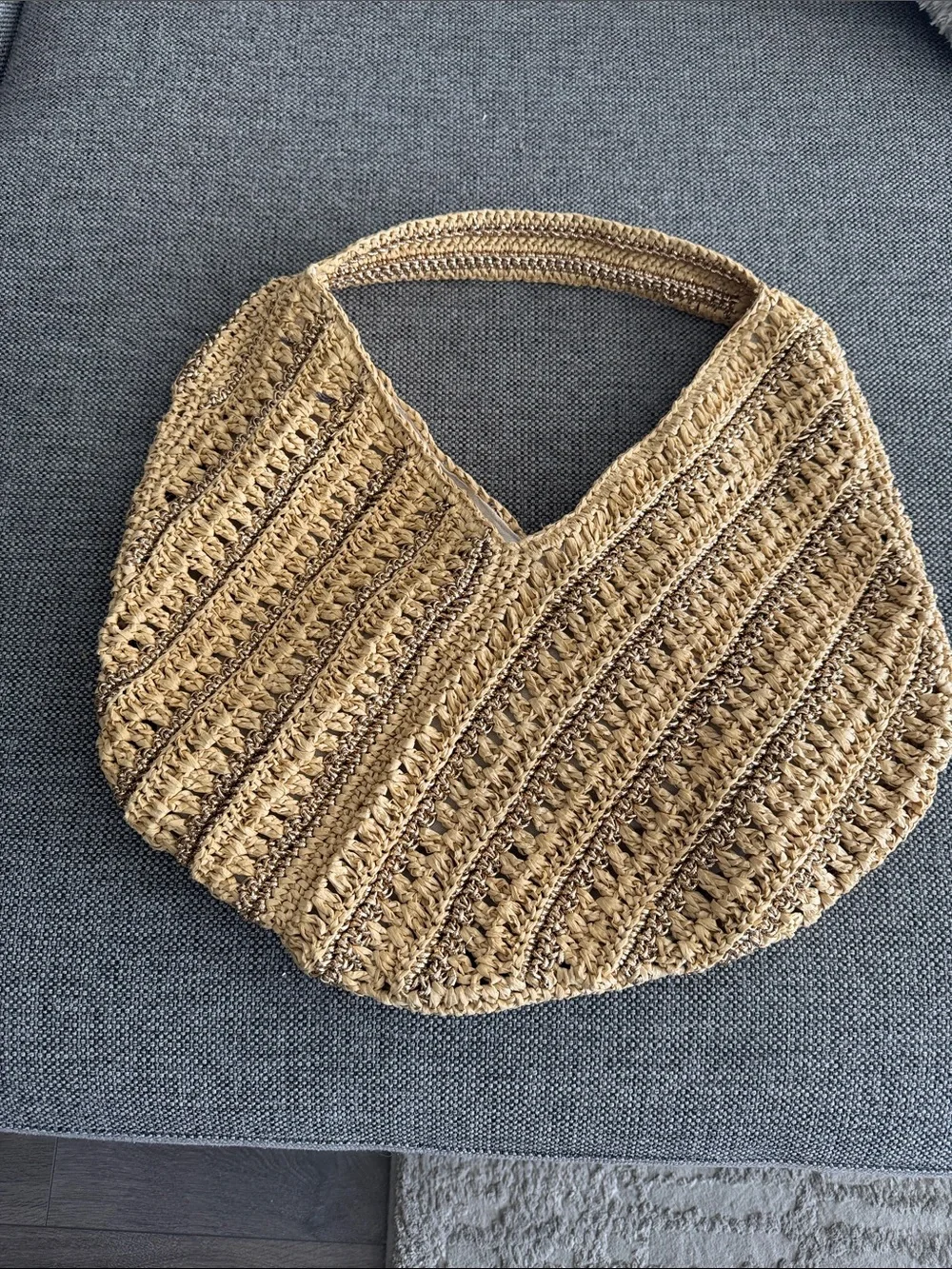 Roomy Raffia tote with lined interior.